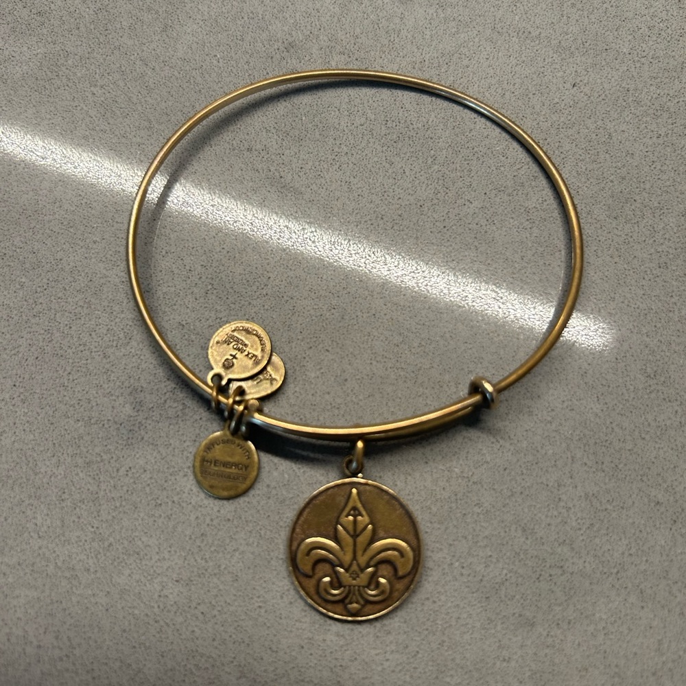 Brass Alex and Ani with Fleur de lis charm